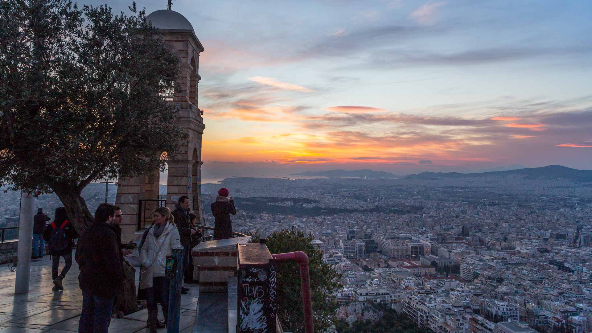 Sunset over a city from a historic monument