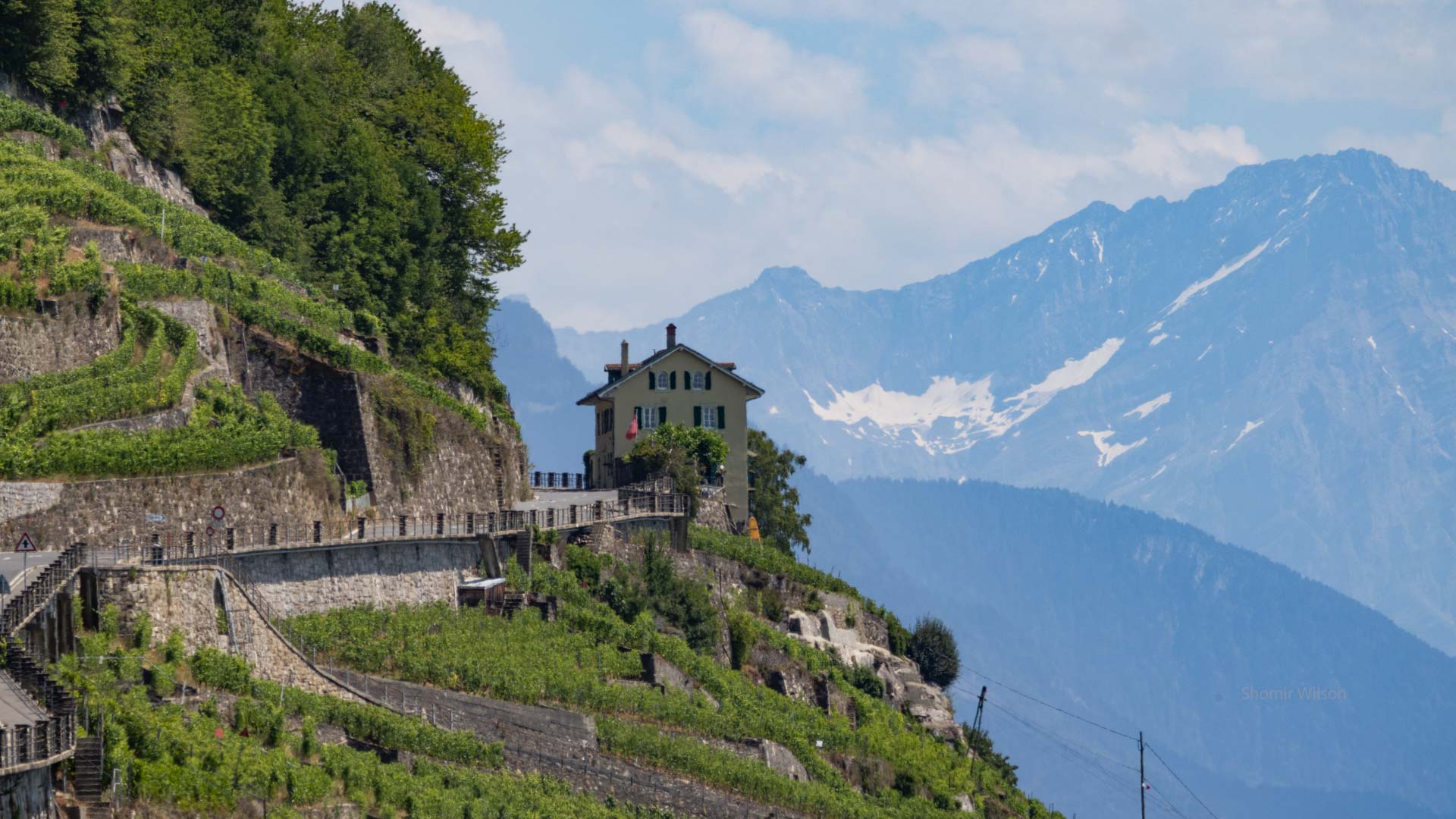 road and house on a steep mountainside